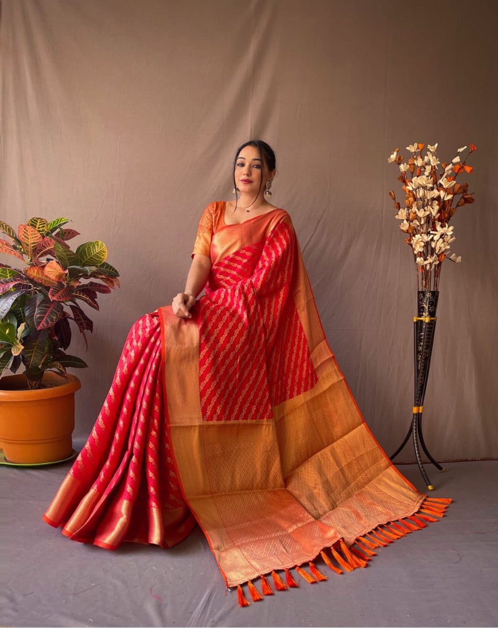Pure Patola Silk Banarasi Saree with Contrast Meenakari Weave & Tassels