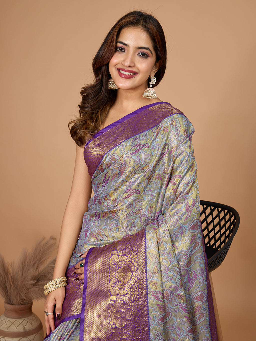 Presenting you Semi Silk saree with all over Jari weaved